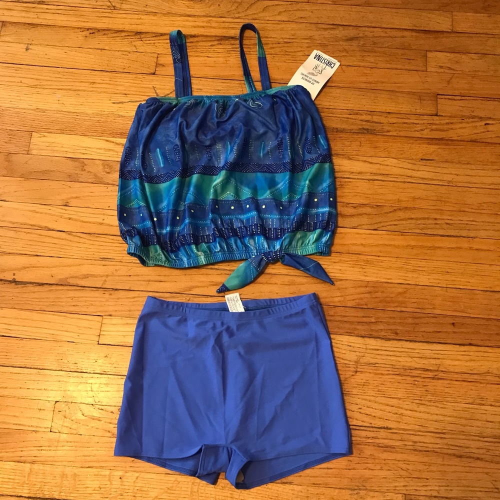 Brand new swimsuit with tags by -Christina